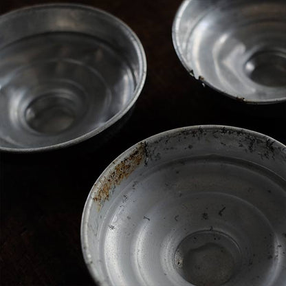 Three carefully used candy jars