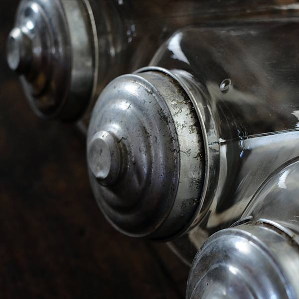Three carefully used candy jars