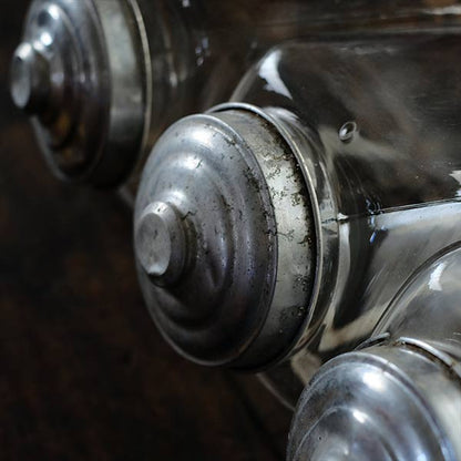 Three carefully used candy jars