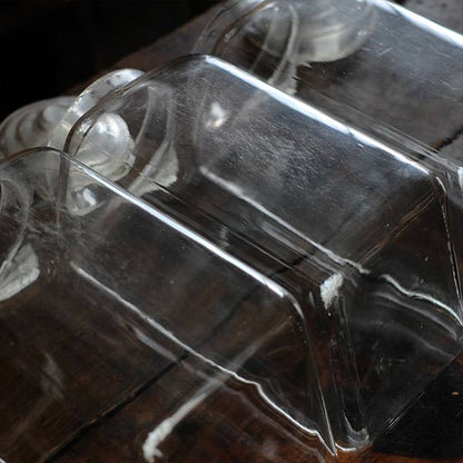 Three carefully used candy jars