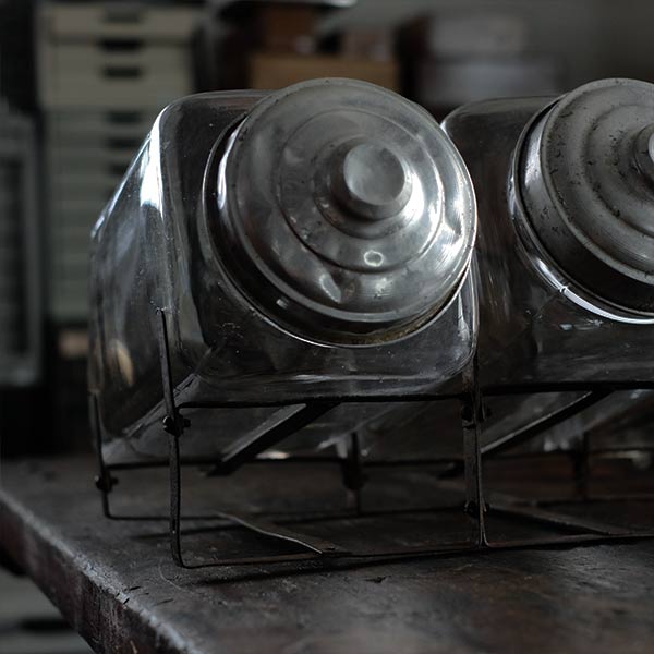 Three carefully used candy jars