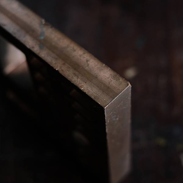 A stamped copper block