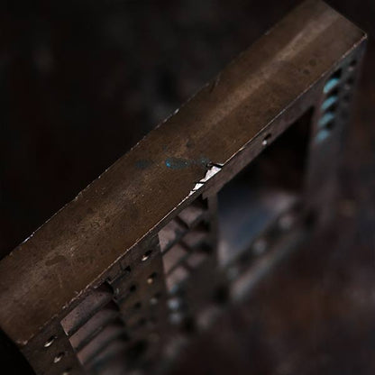 A stamped copper block
