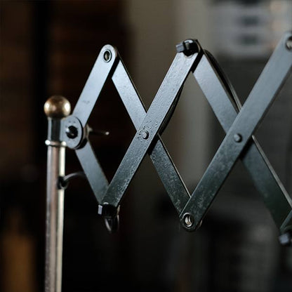 Olive-colored scissor lamp