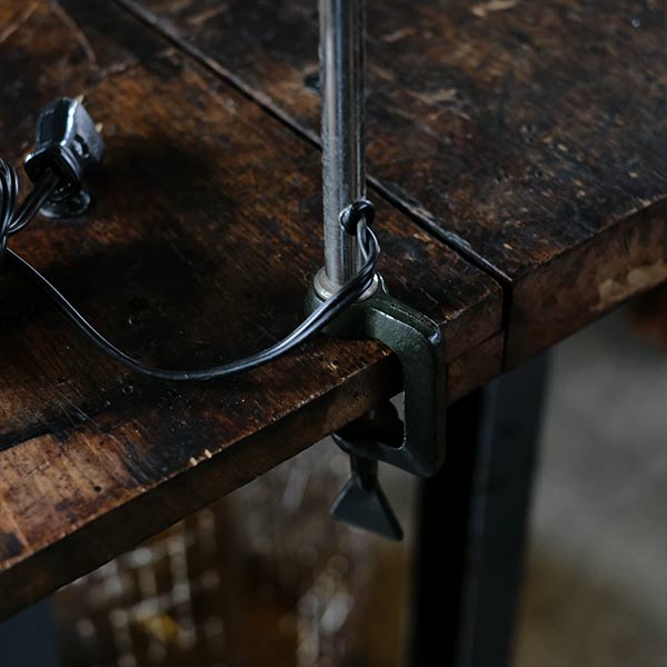 Olive-colored scissor lamp
