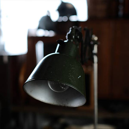 Olive-colored scissor lamp