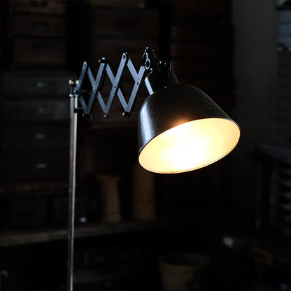 Olive-colored scissor lamp