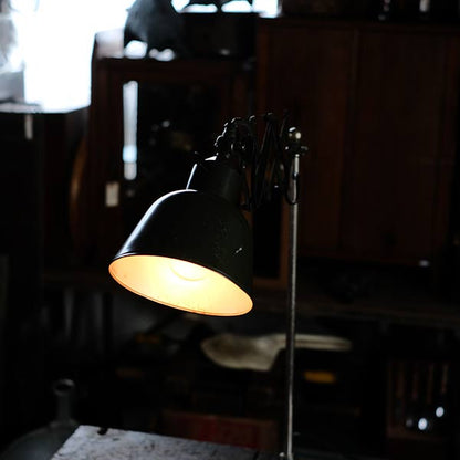 Olive-colored scissor lamp