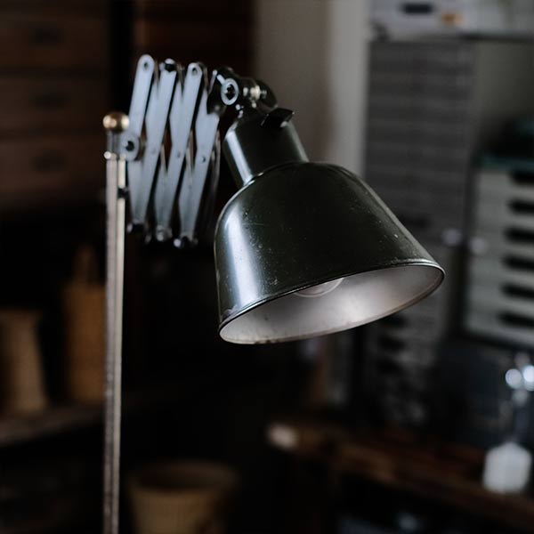 Olive-colored scissor lamp