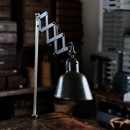 Olive-colored scissor lamp