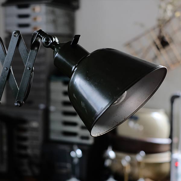 Olive-colored scissor lamp