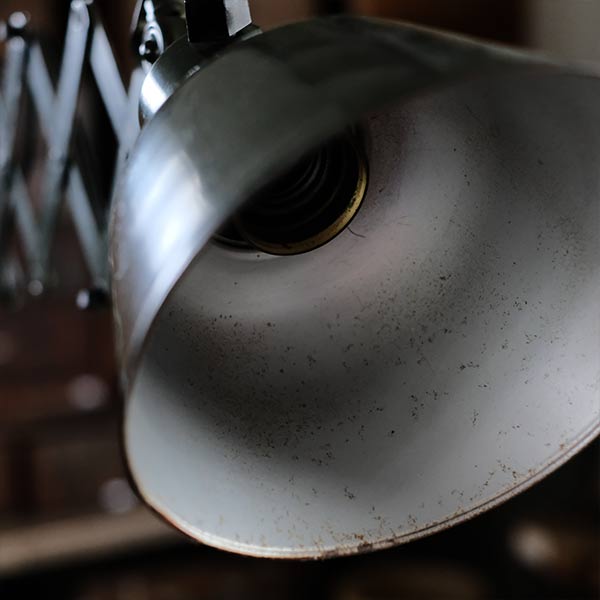 Olive-colored scissor lamp