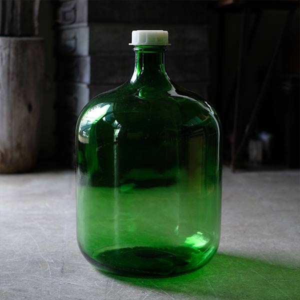Green demijohn bottle