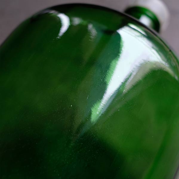 Green demijohn bottle