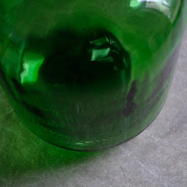 Green demijohn bottle