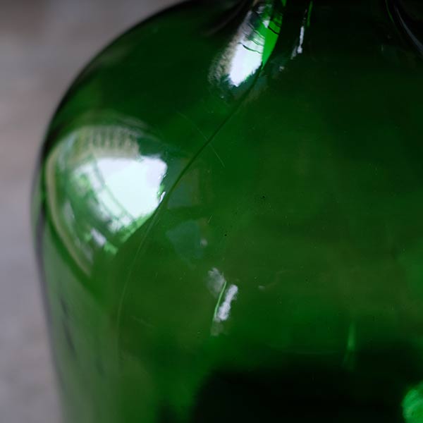 Green demijohn bottle