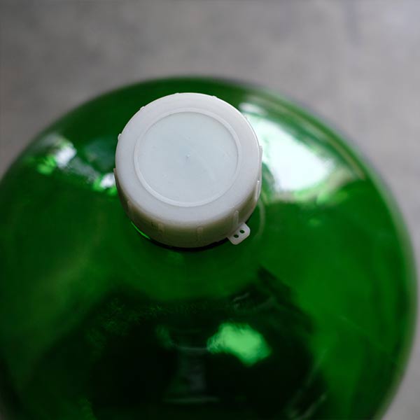 Green demijohn bottle