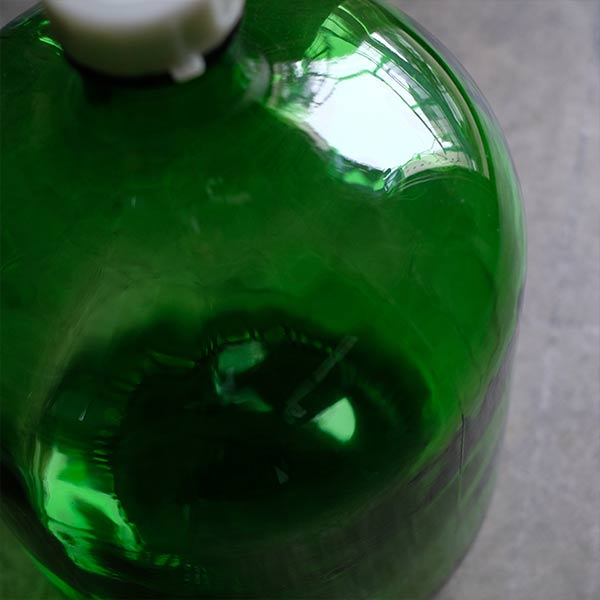 Green demijohn bottle