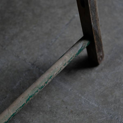 Folding chair with peeling paint