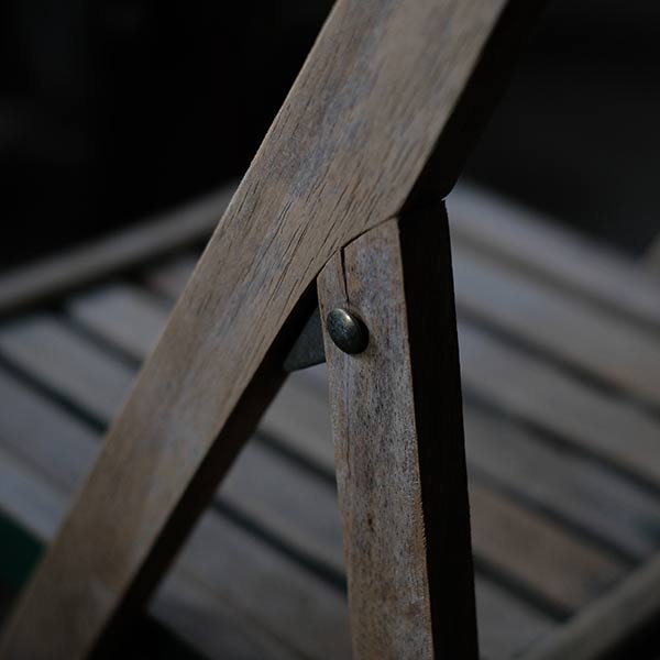 Folding chair with peeling paint