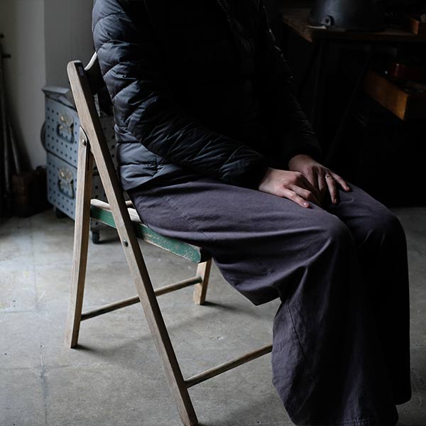 Folding chair with peeling paint