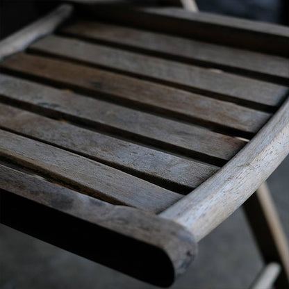 Folding chair with peeling paint