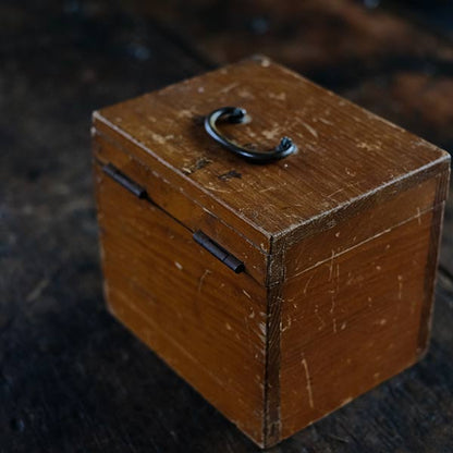 Watchmaker's anvil with wooden box