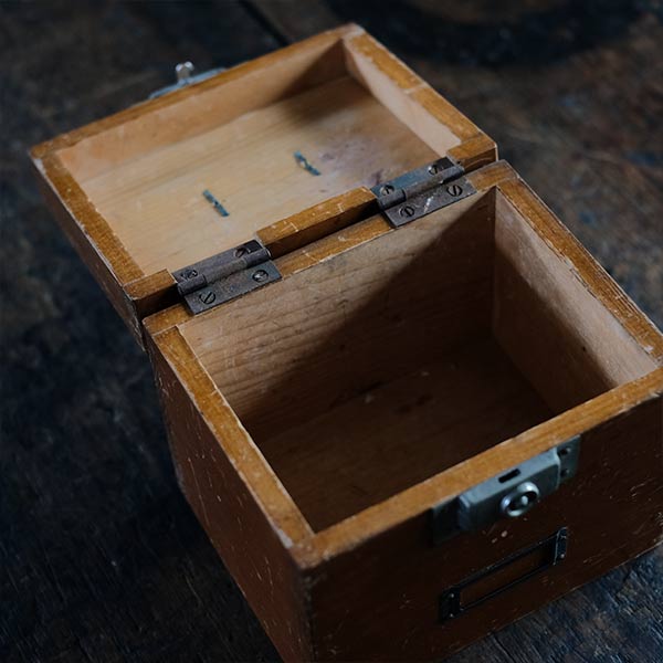 Watchmaker's anvil with wooden box