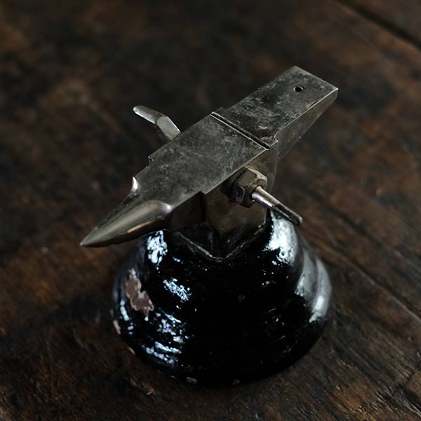 Watchmaker's anvil with wooden box