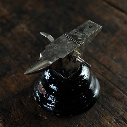 Watchmaker's anvil with wooden box