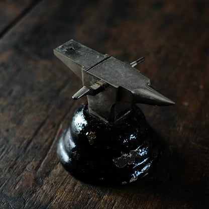 Watchmaker's anvil with wooden box