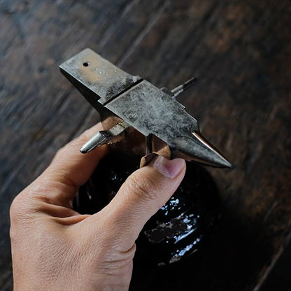 Watchmaker's anvil with wooden box