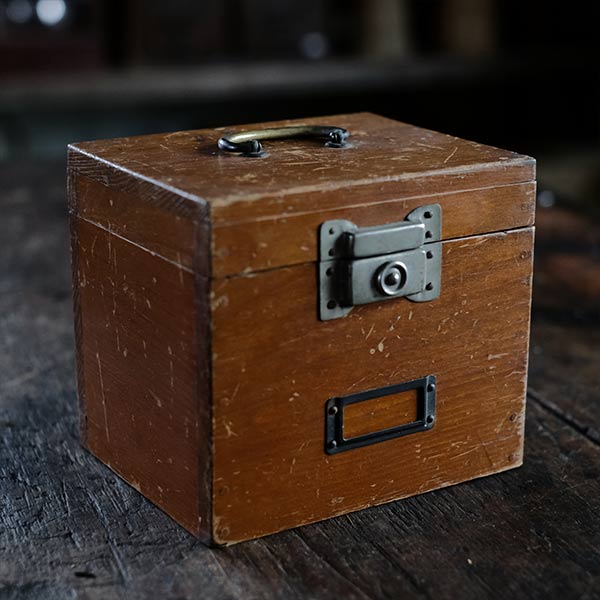 Watchmaker's anvil with wooden box