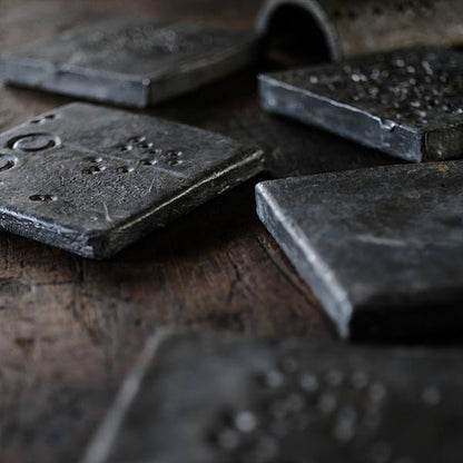 Lead tiles used as workbenches