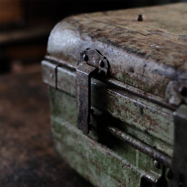 A rusty green trunk