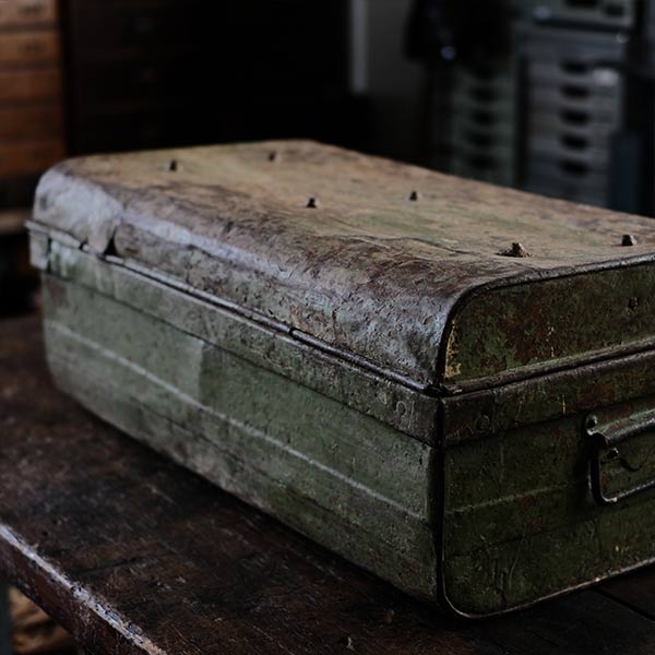 A rusty green trunk