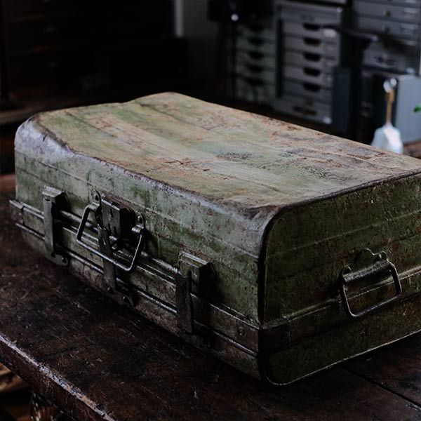 A rusty green trunk
