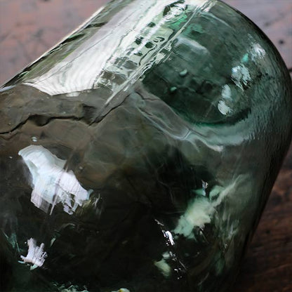 Small sea green demijohn bottle