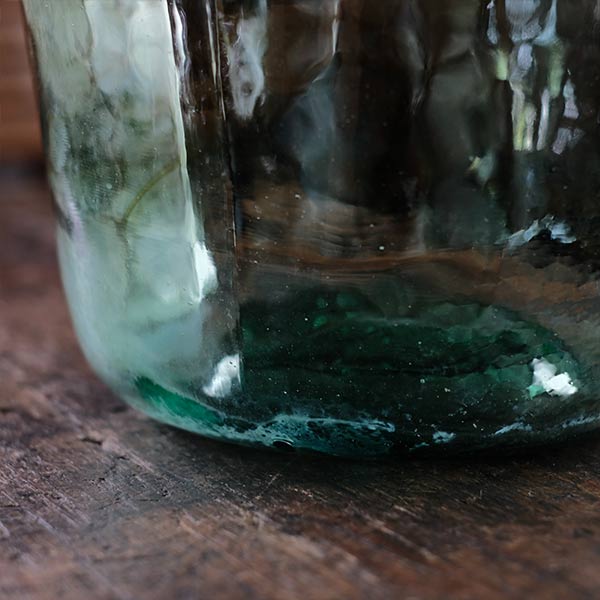 Small sea green demijohn bottle