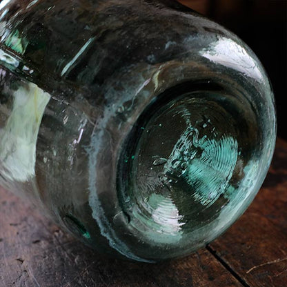 Small sea green demijohn bottle