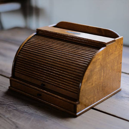 Accordion-style storage box with lid and drawer