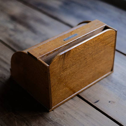 Accordion-style storage box with lid and drawer
