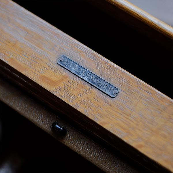 Accordion-style storage box with lid and drawer