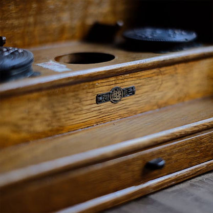 Accordion-style storage box with lid and drawer