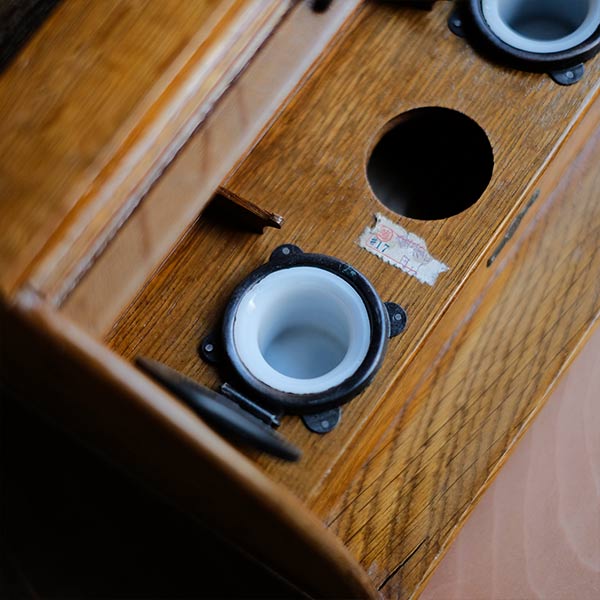 Accordion-style storage box with lid and drawer