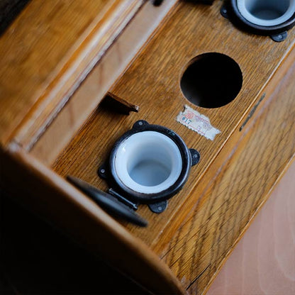 Accordion-style storage box with lid and drawer