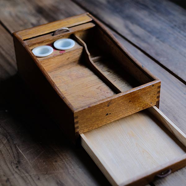 Accordion-style pencil case with drawer