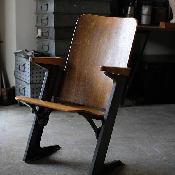 Compact theater chair