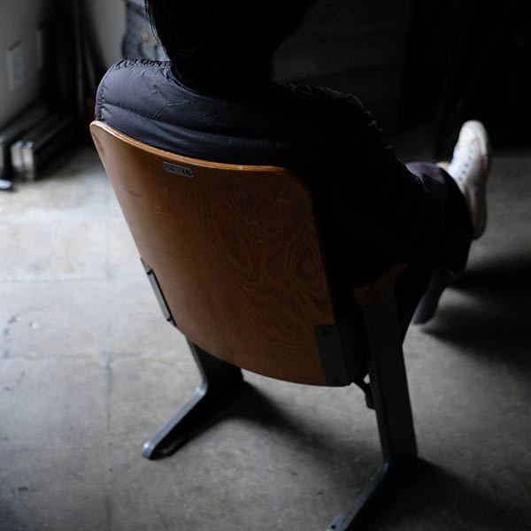 Compact theater chair