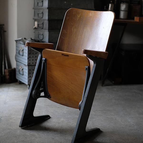 Compact theater chair
